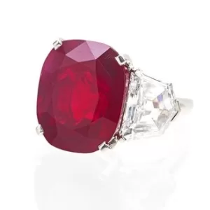 The Sunrise Ruby, a 25.59 ct unheated Burmese ‘pigeon blood red’ ruby mounted in a Cartier ring, sold at Christie’s Geneva in May 2023 for ca. US$ 14.9 million.